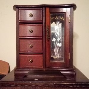 All wood jewelry cabinet.